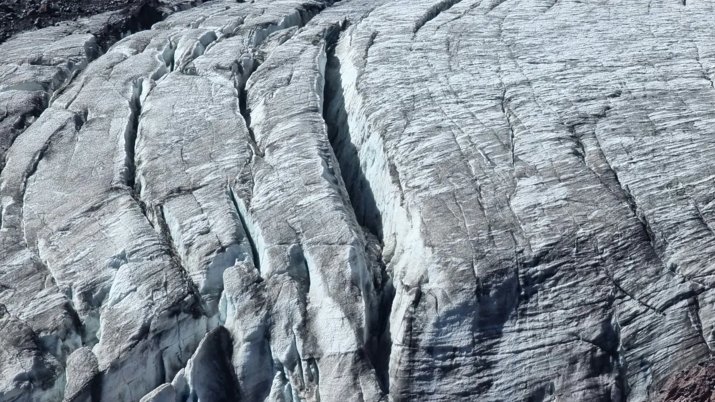 Glacier surface fractured by crevasses